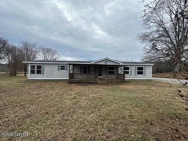 14.4 Acres of Land with Home for Sale in Toone, Tennessee