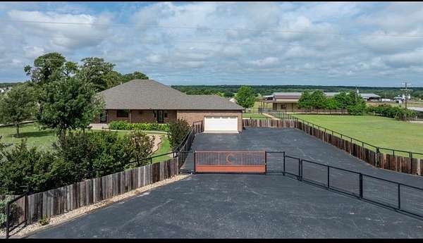 11.5 Acres of Land with Home for Sale in Paradise, Texas