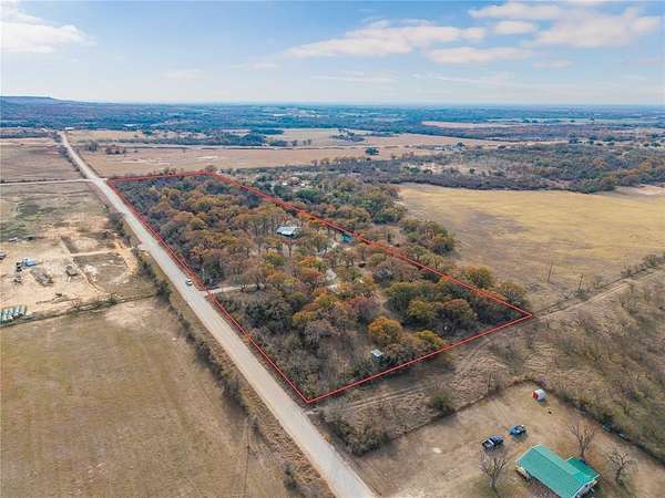 10 Acres of Land with Home for Sale in May, Texas