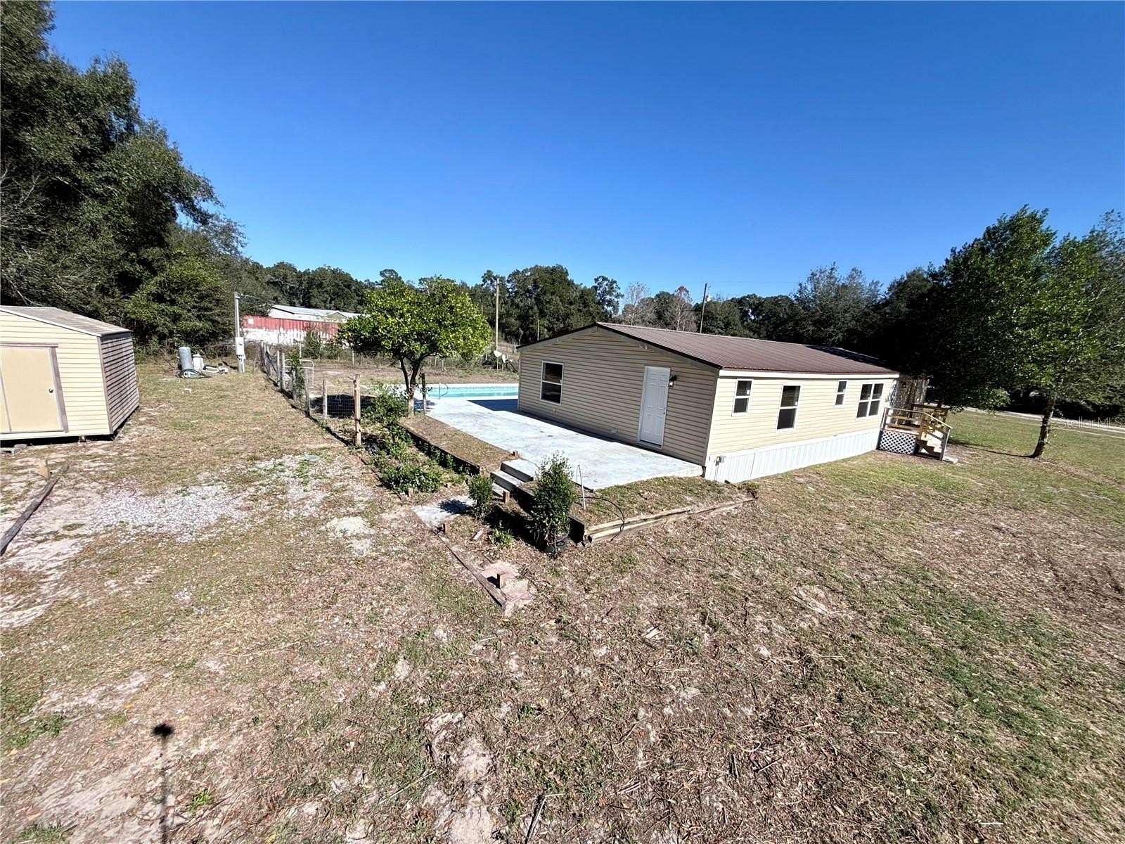 3 Acres of Residential Land with Home for Sale in Summerfield, Florida