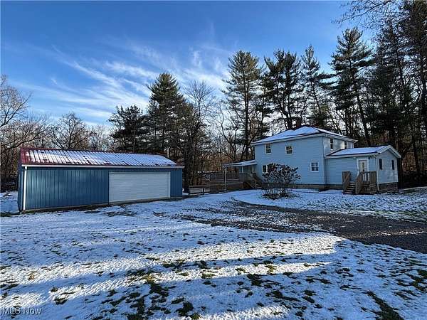 3.87 Acres of Residential Land with Home for Sale in Roseville, Ohio