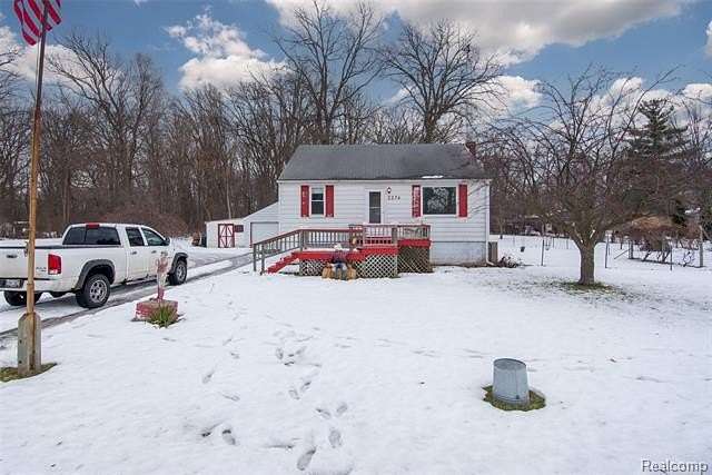 2.25 Acres of Residential Land with Home for Sale in Burton, Michigan