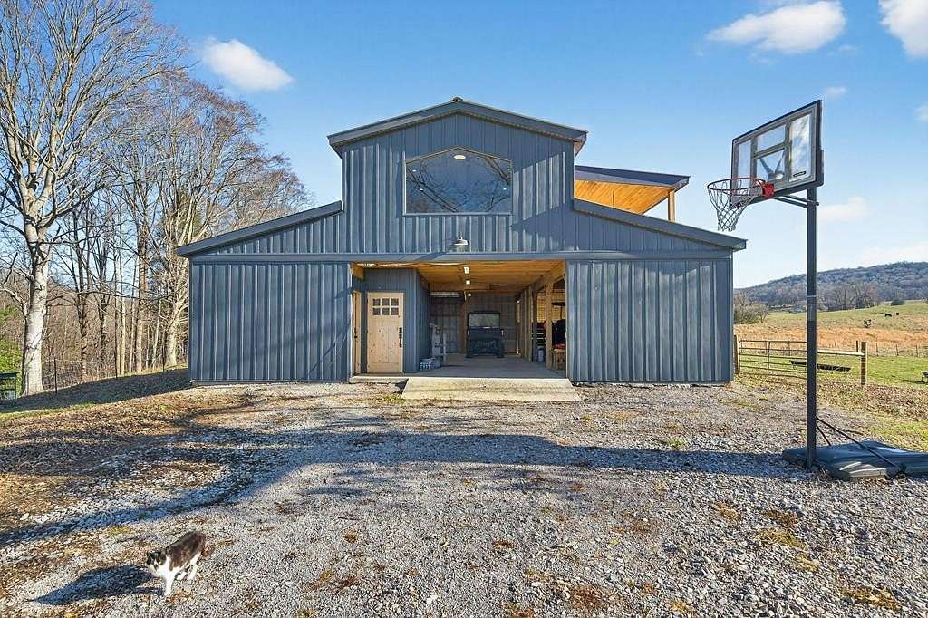 25 Acres of Land with Home for Sale in Pall Mall, Tennessee