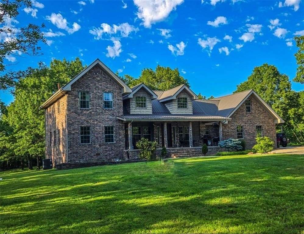 17.9 Acres of Land with Home for Sale in Harrison, Arkansas