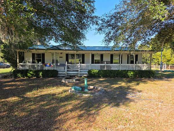 3 Acres of Land with Home for Sale in Reddick, Florida
