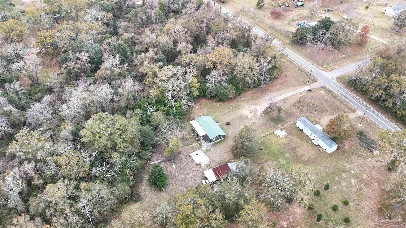1.58 Acres of Residential Land with Home for Sale in Molino, Florida