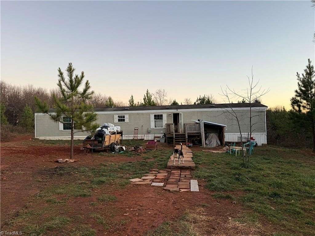 10.5 Acres of Land with Home for Sale in Hamptonville, North Carolina