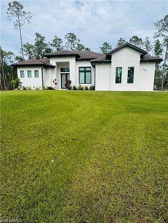 2.4 Acres of Residential Land with Home for Sale in Naples, Florida