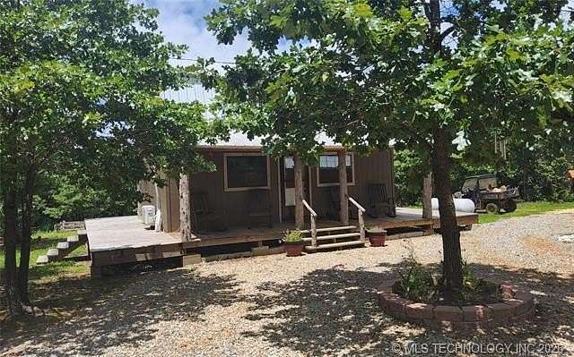 2.5 Acres of Land with Home for Sale in Moyers, Oklahoma