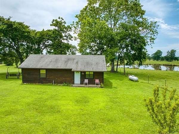 80 Acres of Land with Home for Sale in Broken Bow, Oklahoma