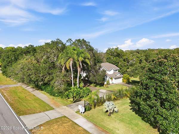 3.12 Acres of Residential Land with Home for Sale in Titusville, Florida