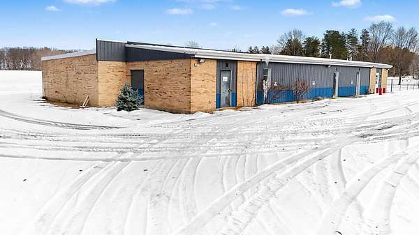 5 Acres of Improved Commercial Land for Sale in Allegan, Michigan