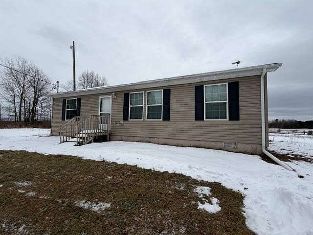 5.3 Acres of Residential Land with Home for Sale in Harrison, Michigan