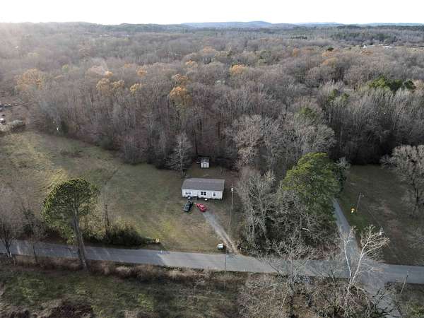 6.4 Acres of Residential Land with Home for Sale in Malvern, Arkansas