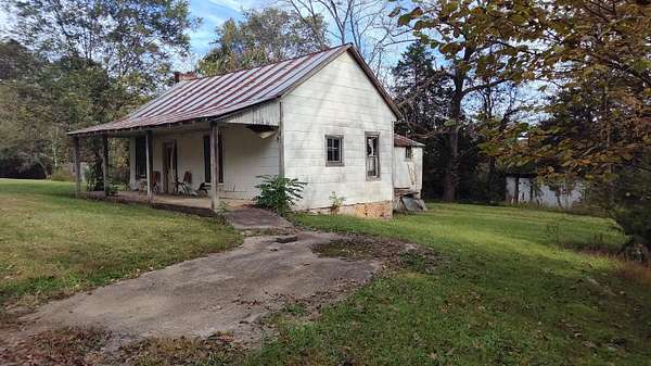 13.2 Acres of Land with Home for Sale in Jasper, Tennessee