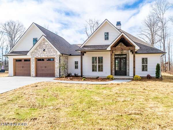 1.5 Acres of Residential Land with Home for Sale in Knoxville, Tennessee