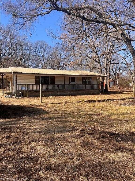 140 Acres of Land with Home for Sale in Porum, Oklahoma