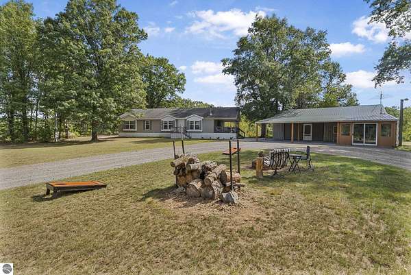 6.25 Acres of Residential Land with Home for Sale in Fife Lake, Michigan