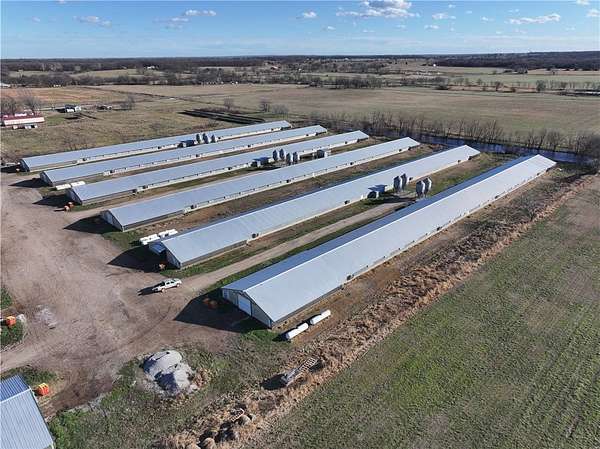 40.5 Acres of Agricultural Land with Home for Sale in Gravette, Arkansas