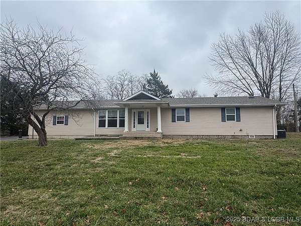 3.32 Acres of Residential Land with Home for Sale in Linn Creek, Missouri