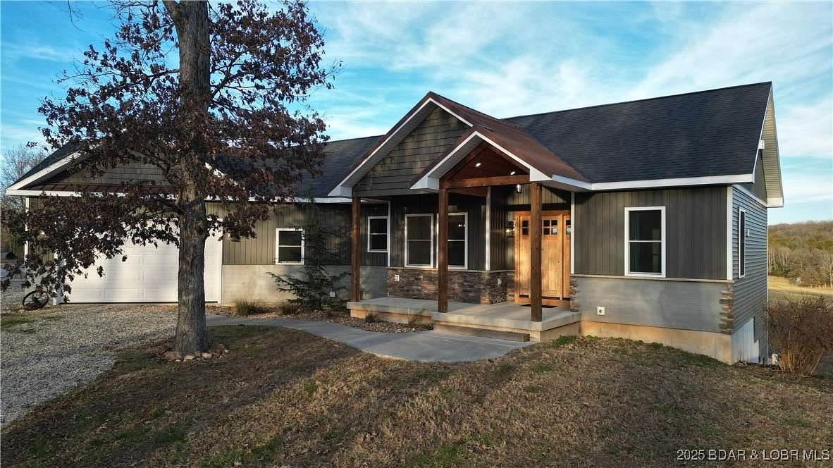 6.9 Acres of Residential Land with Home for Sale in Cole Camp, Missouri