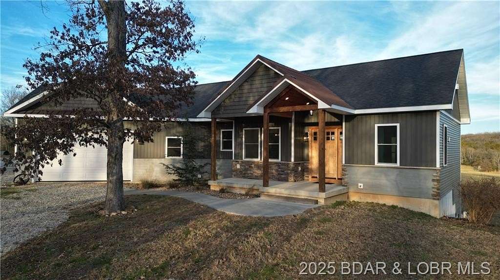 6.9 Acres of Residential Land with Home for Sale in Cole Camp, Missouri