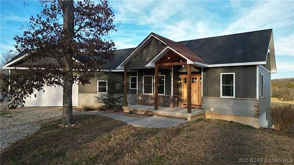 6.9 Acres of Residential Land with Home for Sale in Cole Camp, Missouri