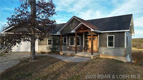 6.9 Acres of Residential Land with Home for Sale in Cole Camp, Missouri