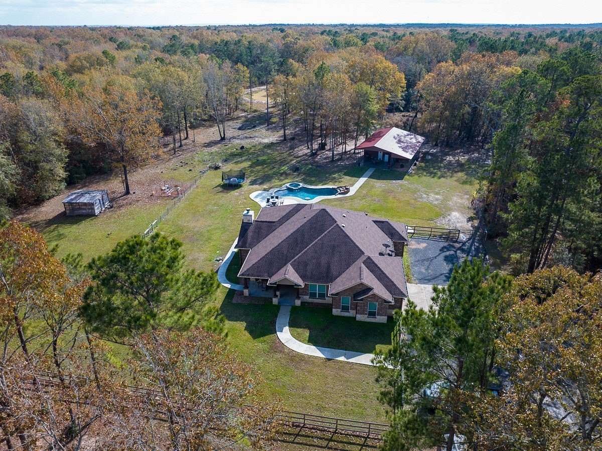 10 Acres of Recreational Land with Home for Sale in Pointblank, Texas