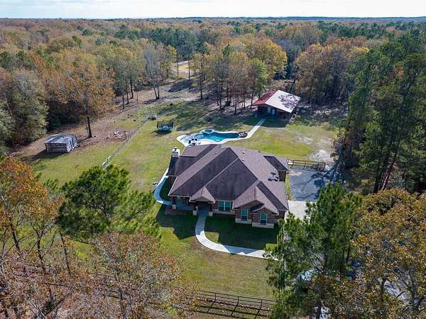 10 Acres of Recreational Land with Home for Sale in Pointblank, Texas