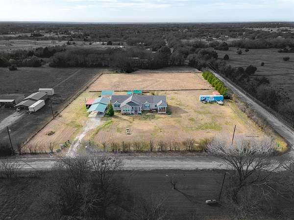 3 Acres of Residential Land with Home for Sale in Scurry, Texas