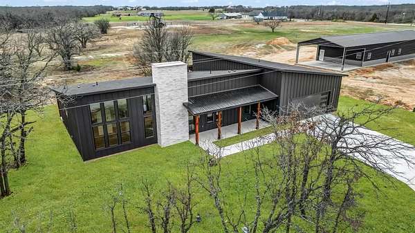 2 Acres of Residential Land with Home for Sale in Poolville, Texas