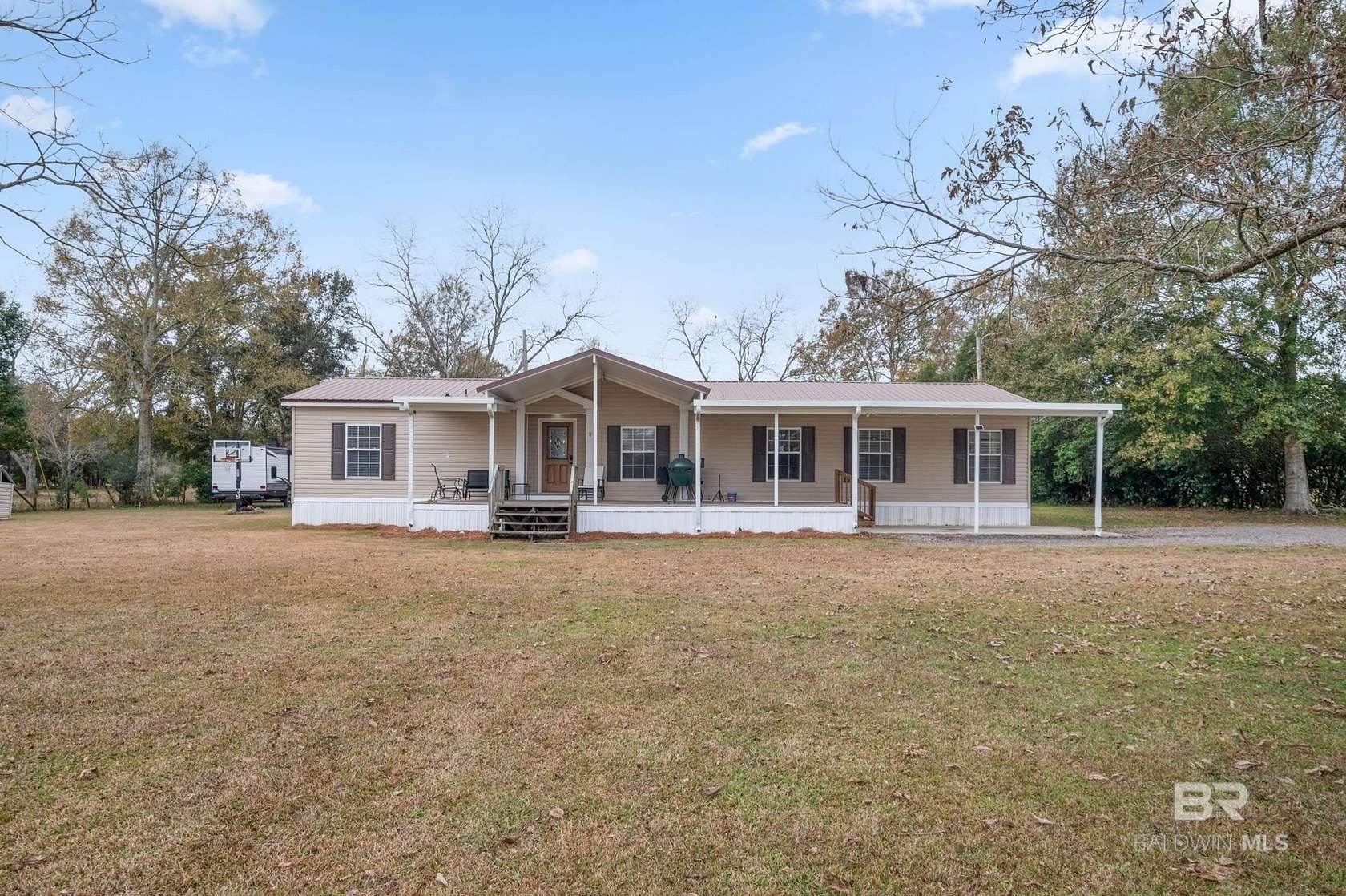 2.69 Acres of Residential Land with Home for Sale in Summerdale, Alabama