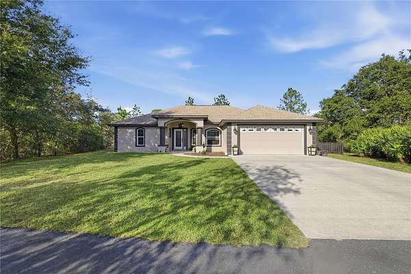 10.2 Acres of Recreational Land with Home for Sale in Dunnellon, Florida