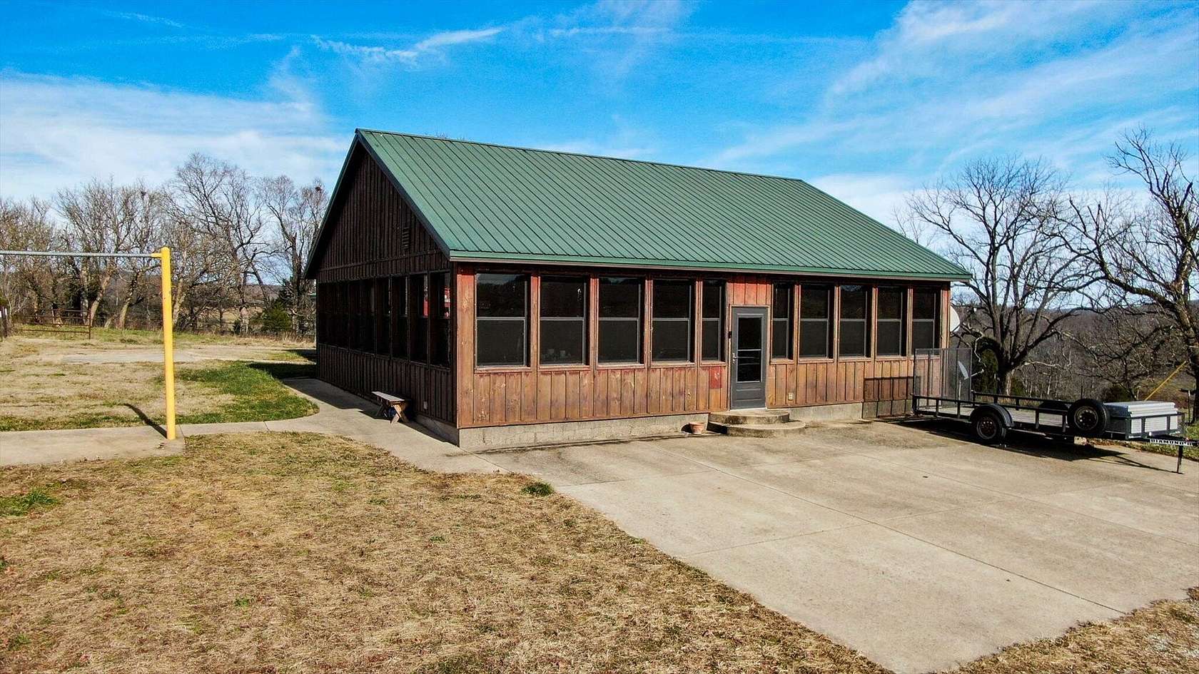 197 Acres of Land with Home for Sale in Bradleyville, Missouri