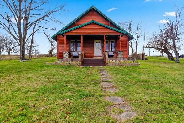 236 Acres of Land with Home for Sale in Bradleyville, Missouri