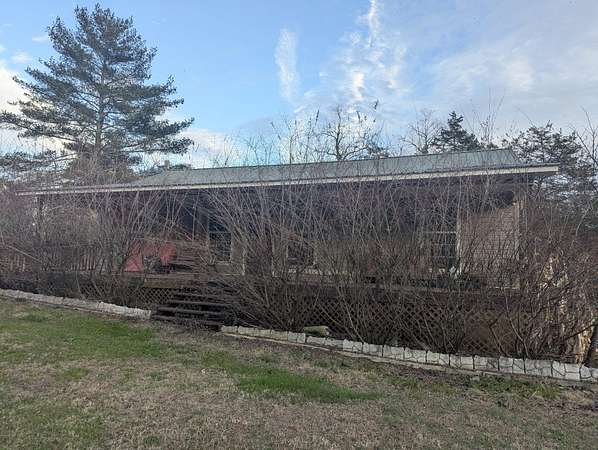 1.5 Acres of Residential Land with Home for Sale in Spring City, Tennessee