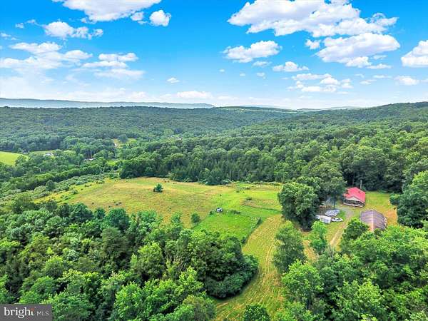 56 Acres of Land with Home for Sale in East Waterford, Pennsylvania