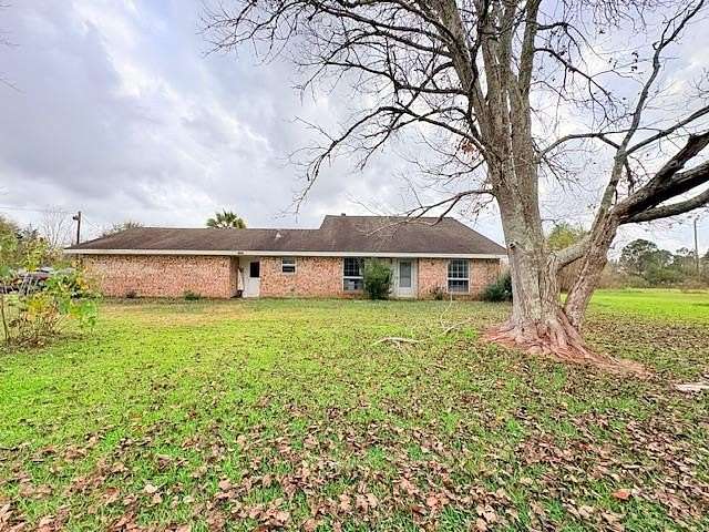 11.5 Acres of Land with Home for Sale in Winnie, Texas