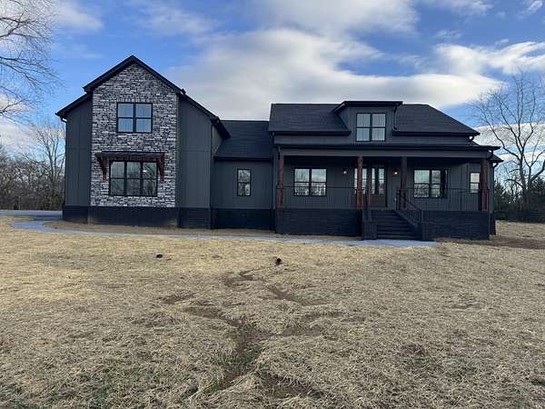 4 Acres of Residential Land with Home for Sale in Cottontown, Tennessee