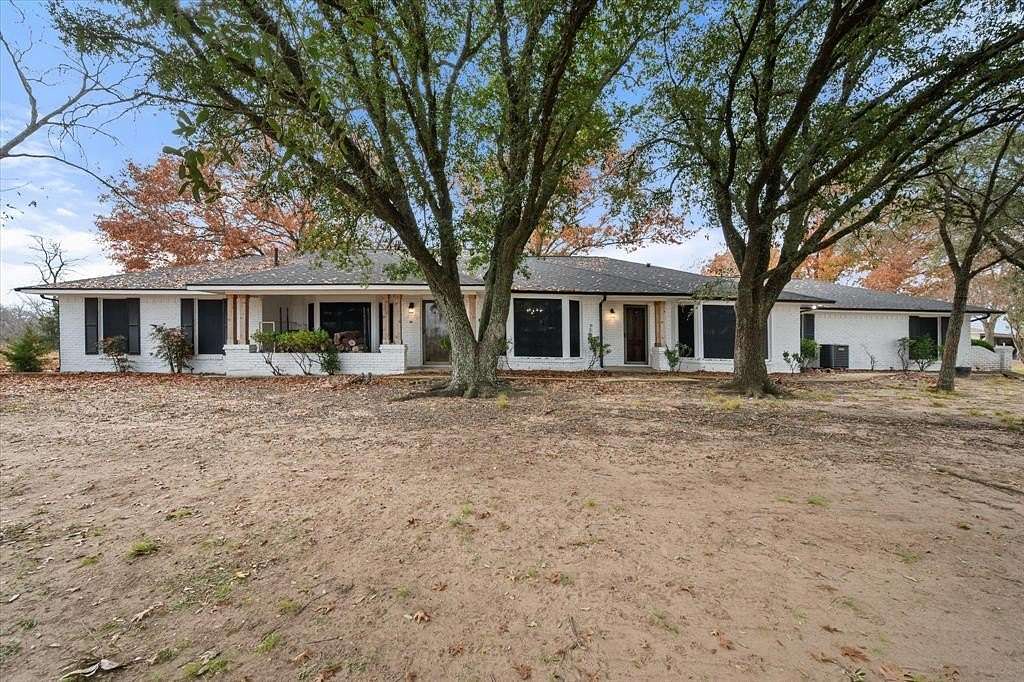 6.89 Acres of Residential Land with Home for Sale in Blooming Grove, Texas