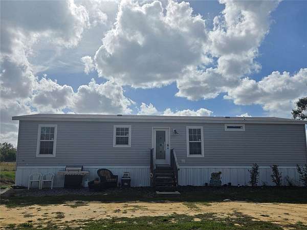 6.35 Acres of Residential Land with Home for Sale in Arcadia, Florida