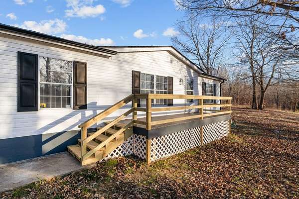 2.35 Acres of Residential Land with Home for Sale in Indian Mound, Tennessee