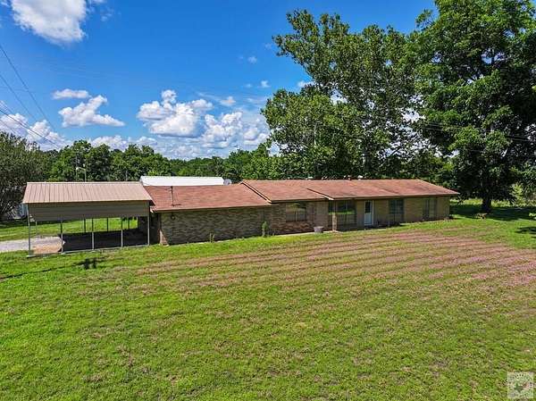 7.4 Acres of Land with Home for Sale in De Kalb, Texas