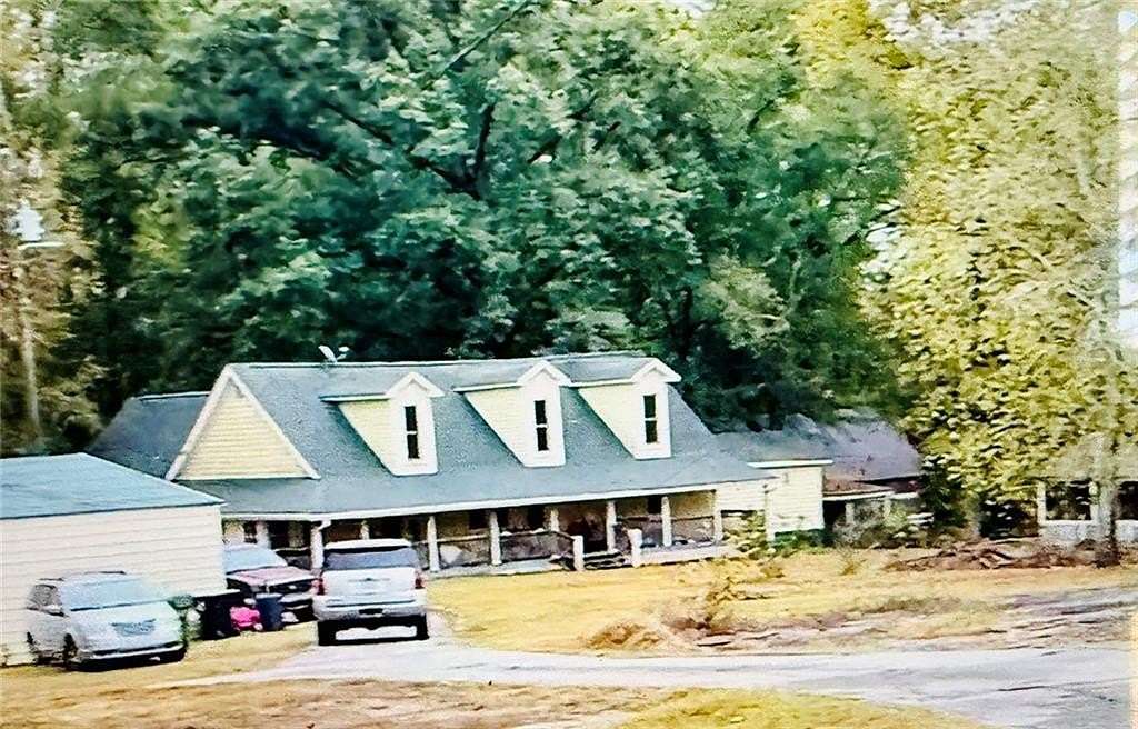 3.37 Acres of Land with Home for Sale in Conyers, Georgia