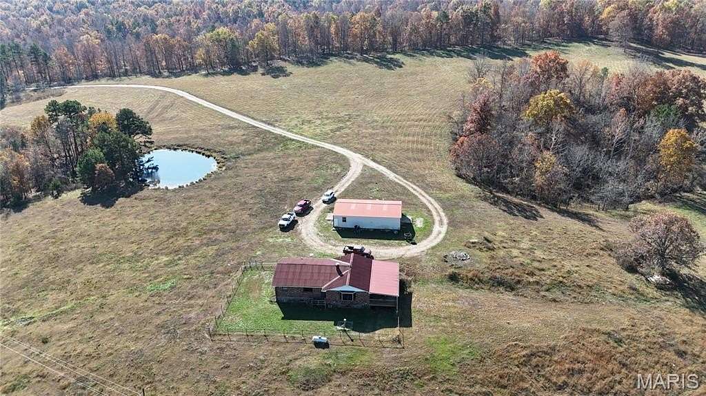 244 Acres of Land with Home for Sale in Ellington, Missouri
