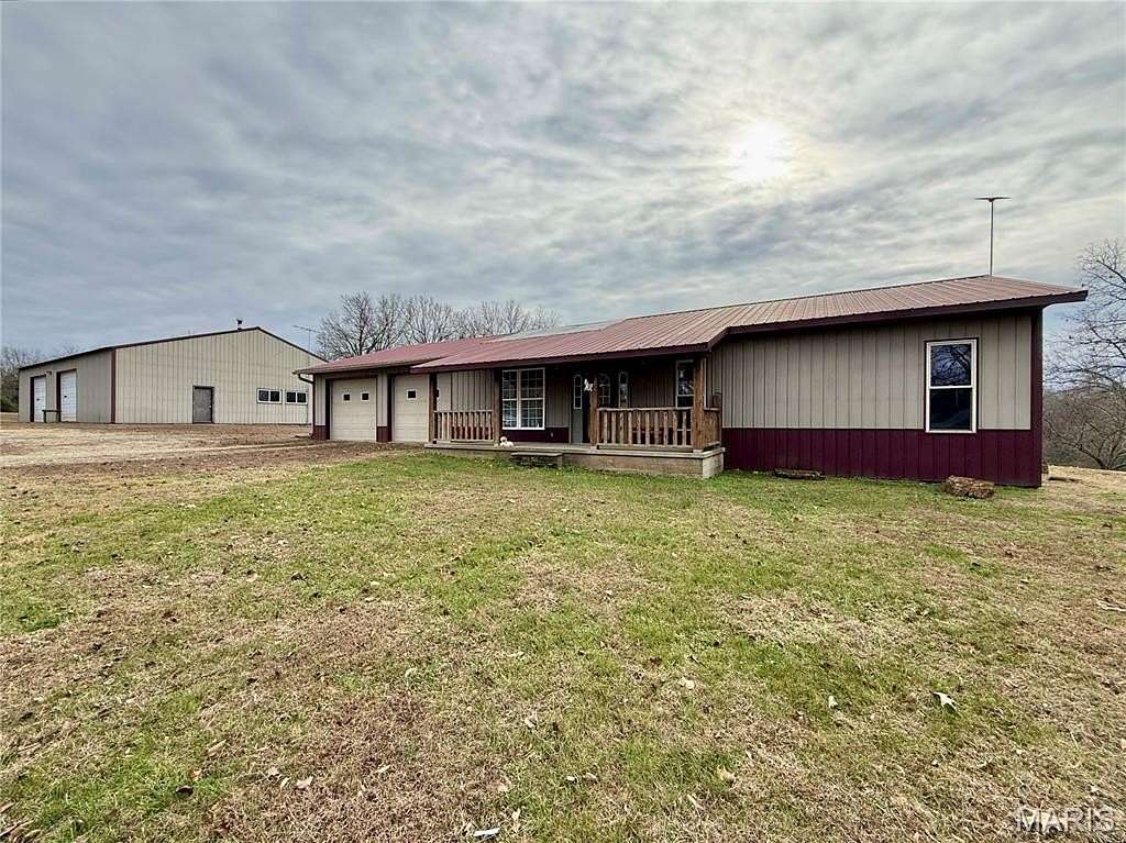 15.3 Acres of Land with Home for Sale in Farmington, Missouri