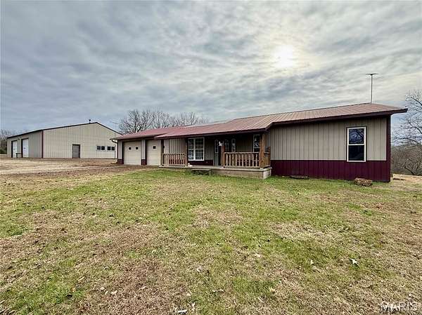 15.3 Acres of Land with Home for Sale in Farmington, Missouri