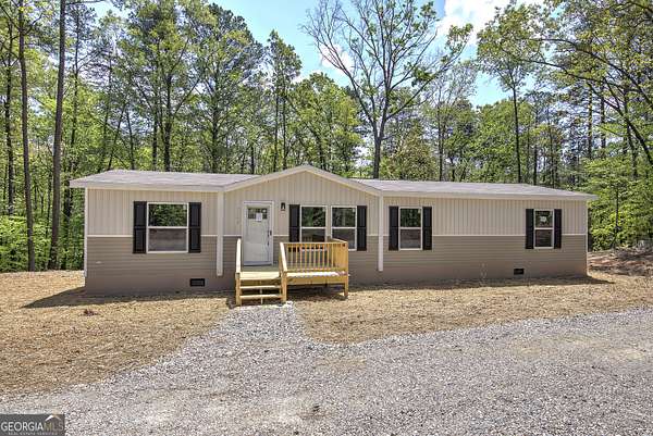 1.5 Acres of Land with Home for Sale in Talking Rock, Georgia