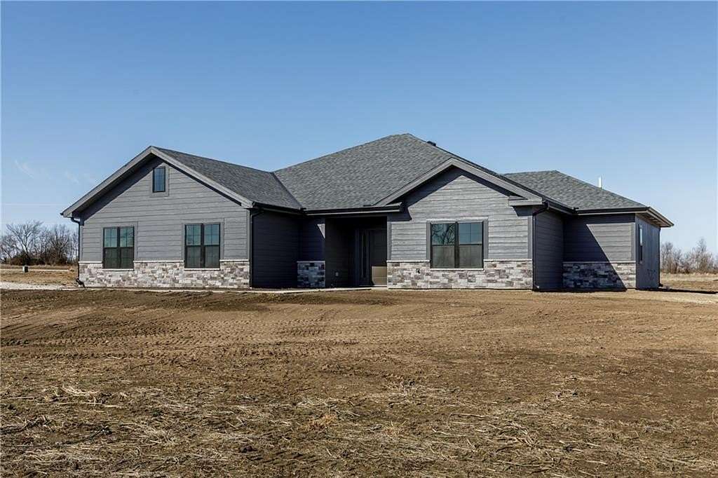 5.47 Acres of Land with Home for Sale in Holden, Missouri